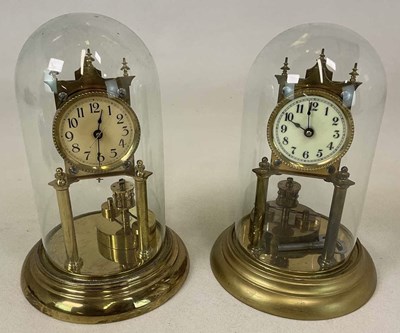 Lot 332 - Two brass anniversary clocks, each mounted...