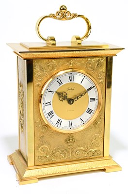 Lot 2635 - IMHOF; a contemporary gilt metal mantel clock...