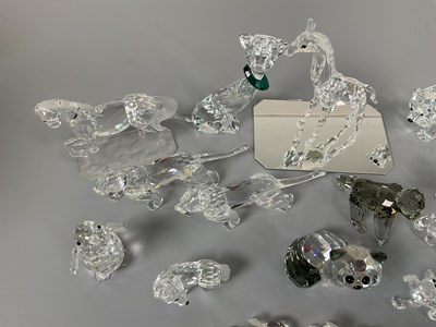 Lot 246 - SWAROVSKI; a group of animal figures including...