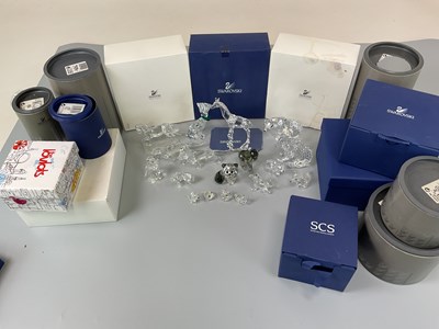 Lot 246 - SWAROVSKI; a group of animal figures including...