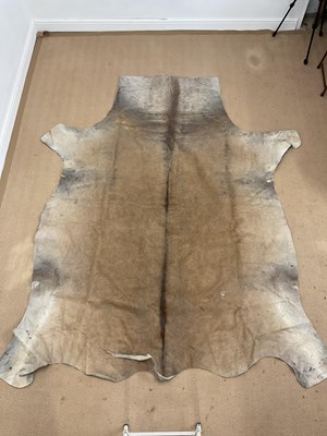 Lot 366 - A South African cow hide rug, length 230cm,...