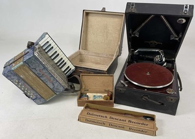 Lot 81 - A Columbia portable gramophone, a small Hohner...