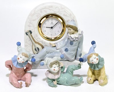 Lot 521 - LLADRO; a figural mantel clock representing a...