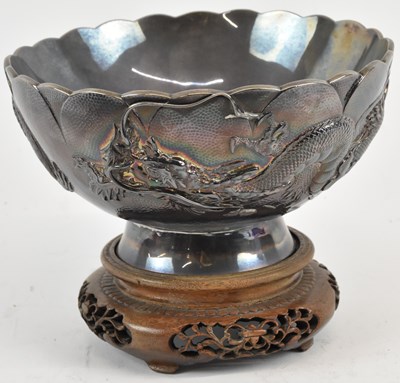 Lot 1113 - A Chinese Export silver bowl on carved...