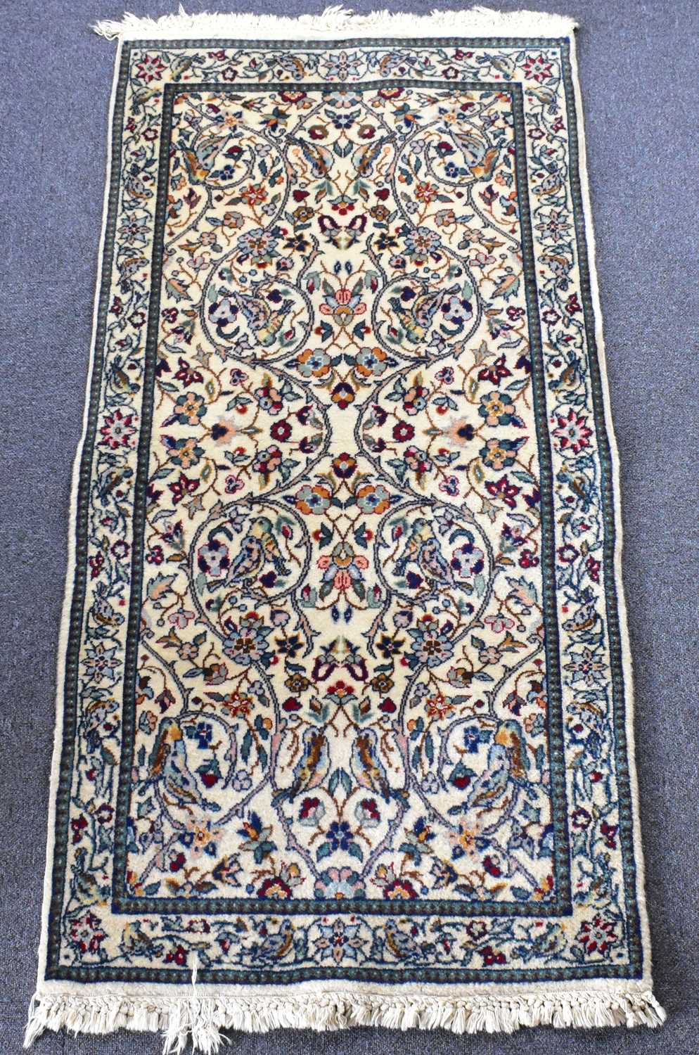 Lot 96 - A modern Chinese rug with floral patterns and