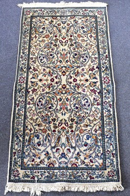 Lot 96 - A modern Chinese rug with floral patterns and...