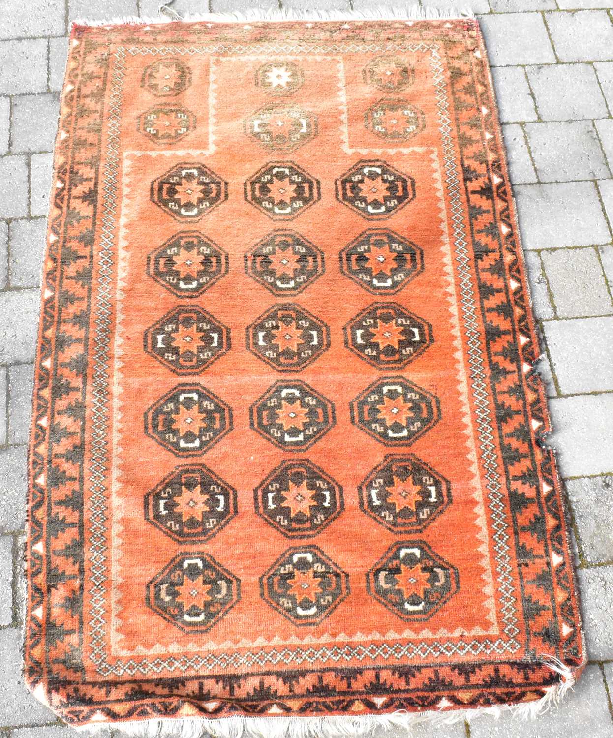 Lot 99 A vintage Turkish rug with six rows of three