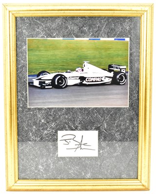 Lot 415 - JENSON BUTTON; a framed display featuring a...