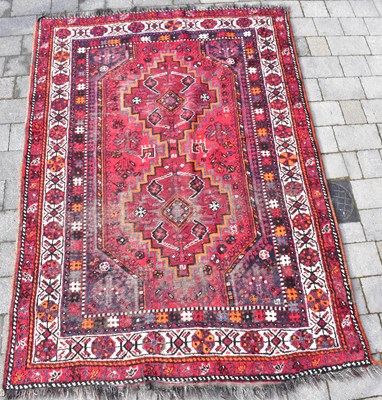 Lot 101 - A vintage Turkish-style rug with two central...