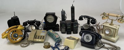 Lot 36 - A quantity of telephones to include a bakelite,...