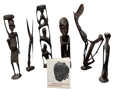 Lot 1071 - Six East African Makonde carved figures,...