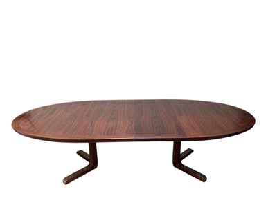Lot 1029 - DYRLUND; a 1970s Danish rosewood dining table,...