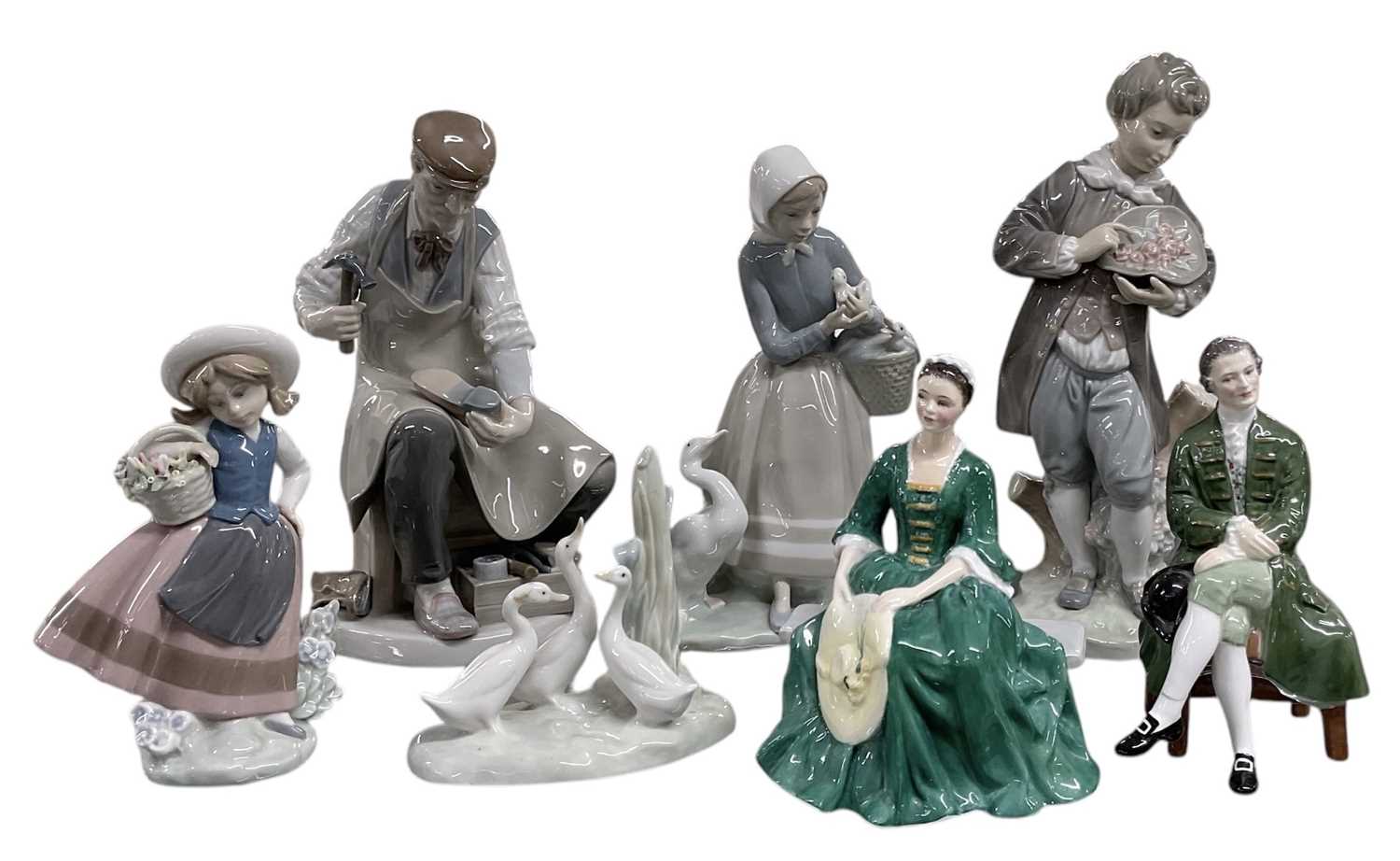 Lot 537 - LLADRÓ; five ceramic figures comprising young...