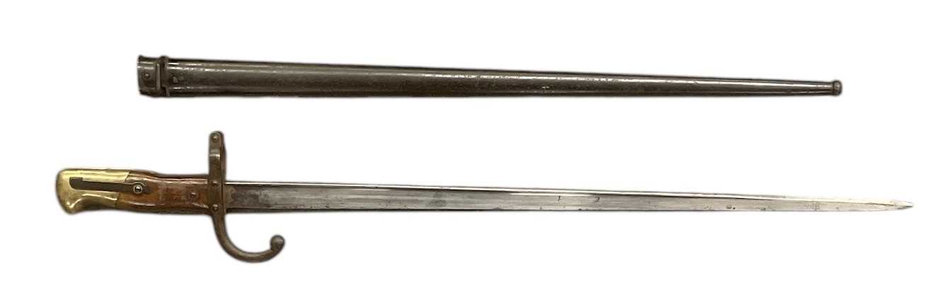Lot 405 - A late 19th century French bayonet, the blade...