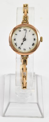 Lot 1614 - A lady's vintage 9ct gold wristwatch, the...