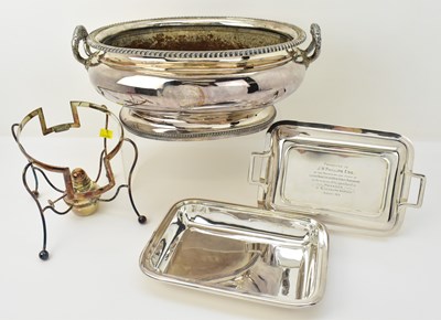 Lot 1083 - A large silver plated ice cooler of oval shape...