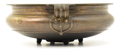 Lot 1040 - A large bronze censer of shallow form, raised...