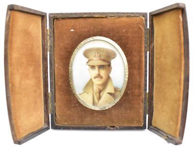 Lot 212 - A small oval watercolour portrait of a WWI...