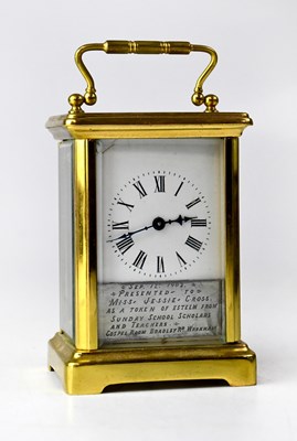 Lot 132 - A brass cased carriage clock, the enamelled...