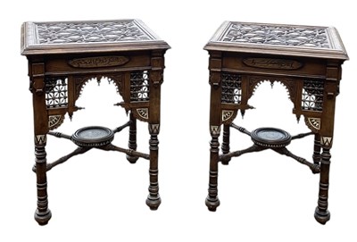 Lot 44 - A pair of carved Arabic side tables/plinths,...