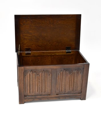 Lot 62 - A reproduction oak blanket chest of small...