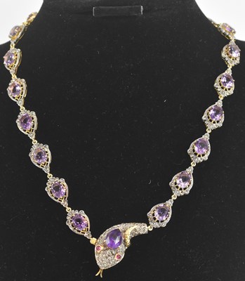 Lot 1435 - A yellow metal amethyst and diamond set prong...