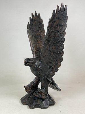 Lot 10 - A large carved wooden model of an eagle,...