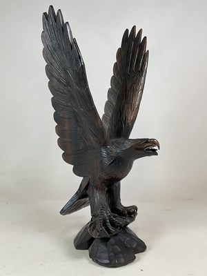 Lot 10 - A large carved wooden model of an eagle,...
