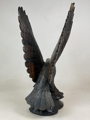 Lot 10 - A large carved wooden model of an eagle,...