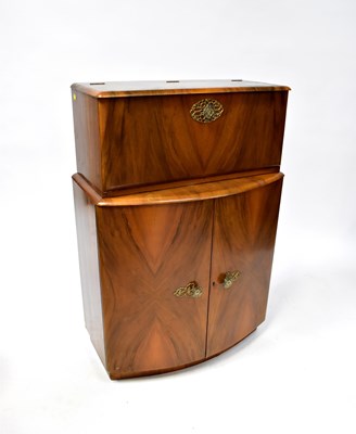 Lot 69 - An Art Deco walnut veneered cocktail cabinet...