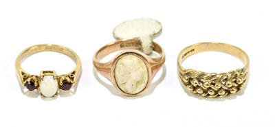 Lot 1136 - A 9ct rose gold signet ring (cut) and two...