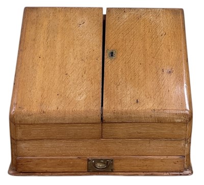 Lot 311 - An early 20th century oak stationery box, with...