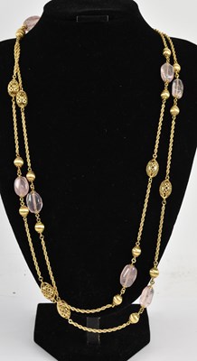 Lot 1431 - An 18ct yellow gold rose quartz set necklace,...