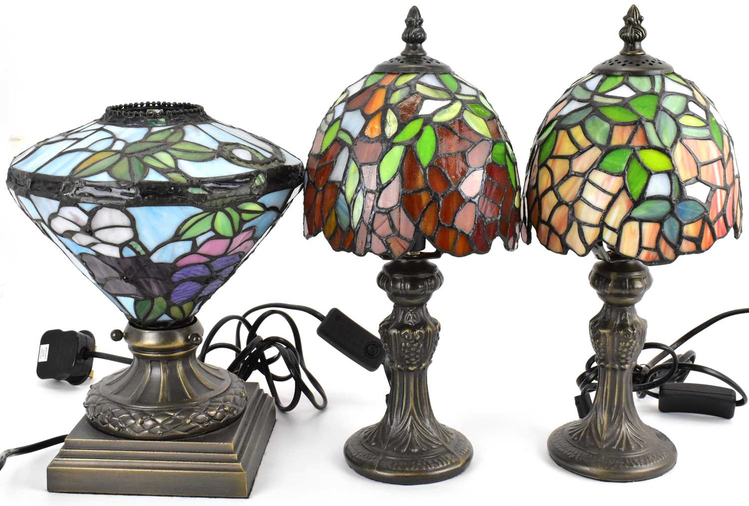 Lot 118 - Three Tiffany-style small table lamps with...