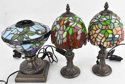 Lot 118 - Three Tiffany-style small table lamps with...