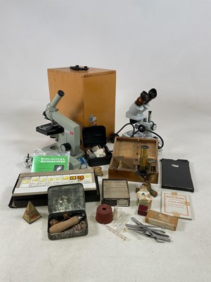 Lot 83 - A collection of microscopes, including two...