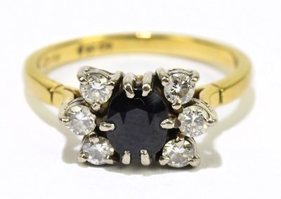 Lot 1036 - An 18ct yellow gold sapphire and diamond...
