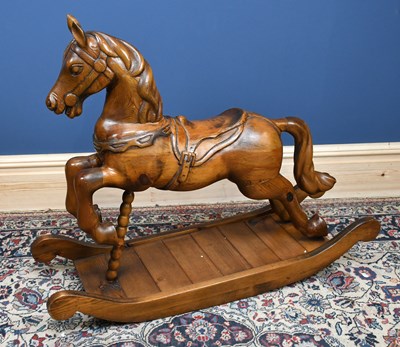 Lot 181 - A modern oak Spanish rocking horse, height 84cm.