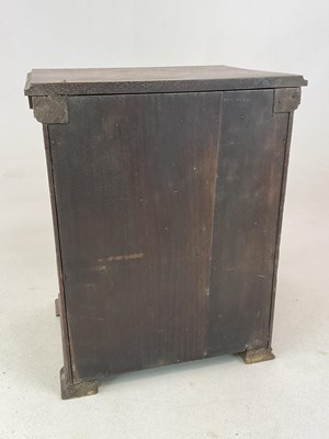 Lot 13 - An Art Nouveau oak smoker's cabinet with...