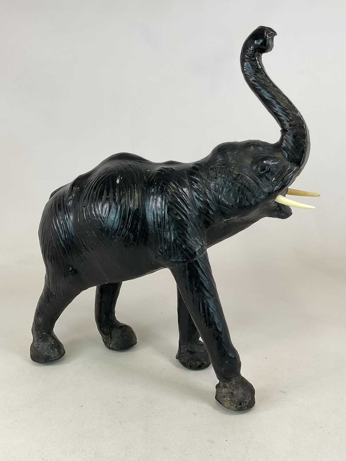 Lot 7 - In the style of Liberty of London, black...