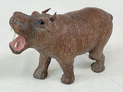 Lot 26 - In the style of Liberty of London, a brown...