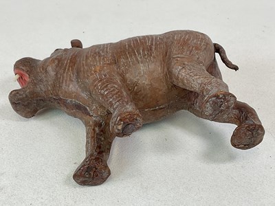 Lot 26 - In the style of Liberty of London, a brown...