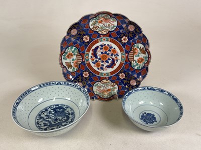 Lot 388 - A Japanese Imari scallop edged charger,...