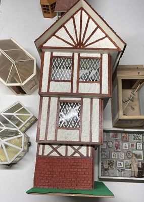 Lot 132 - A Tudor style doll's house, together with...