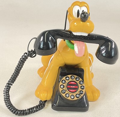 Lot 28 - DISNEY; a Pluto landline push button telephone,...