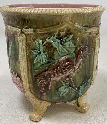 Lot 302 - A majolica jardiniere with relief decoration...