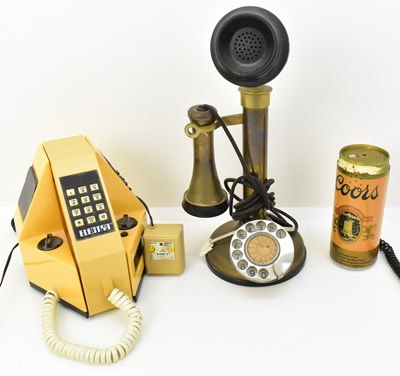 Lot 301 - Three vintage and novelty telephones...