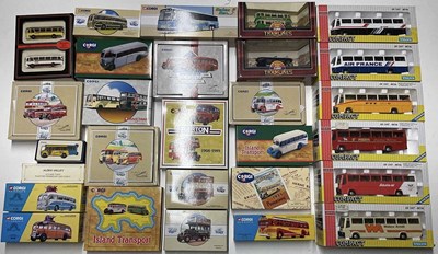 Lot 102 - A collection of model coaches and buses,...