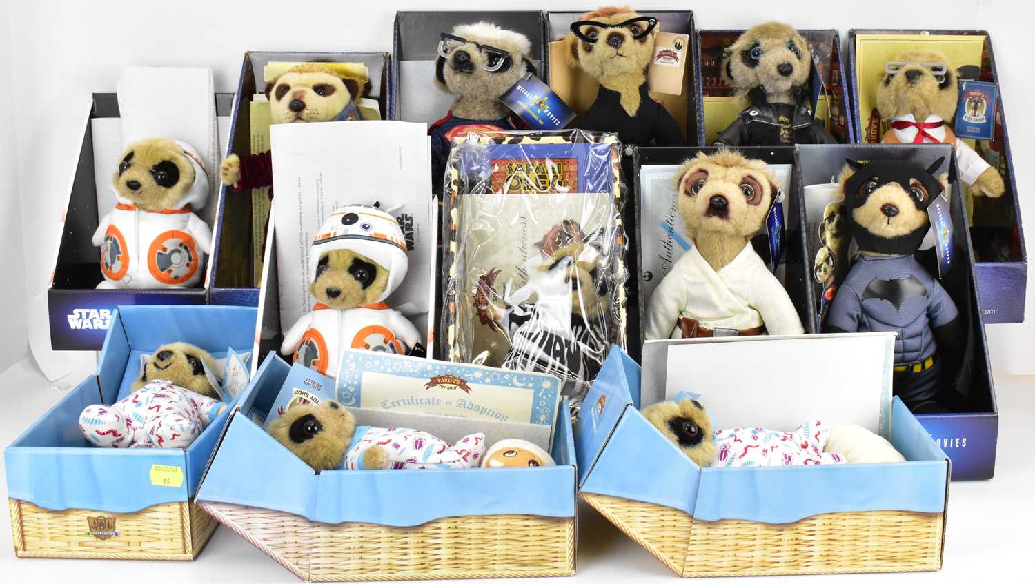 Lot 187 - Thirteen various Meerkat collectors' toys in...