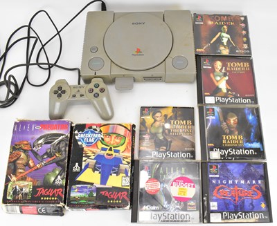 Lot 149 - A PlayStation One games controller with six...